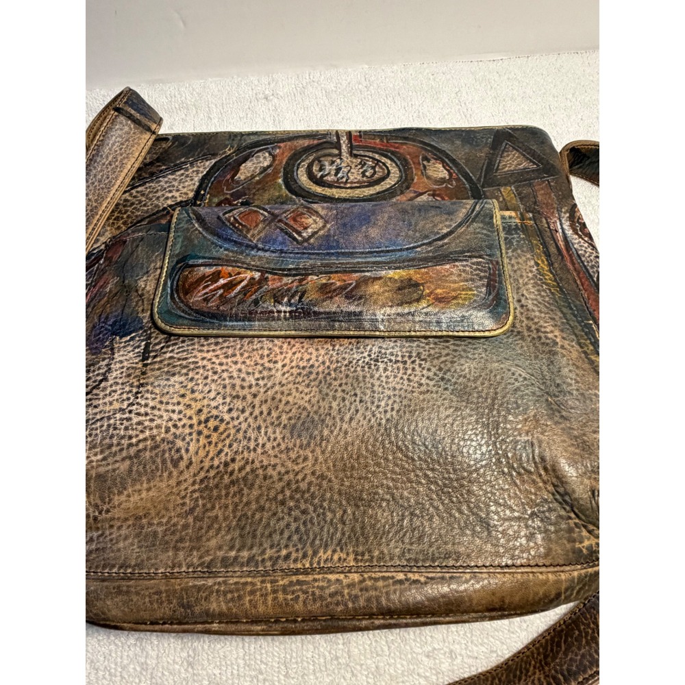 Vintage-Inspired Brown Leather Crossbody Bag with Artistic Accents